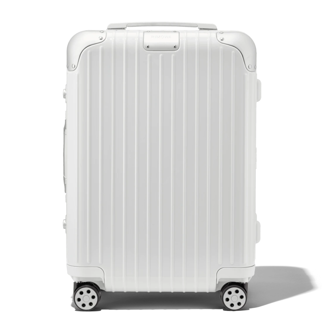 white leather suitcase