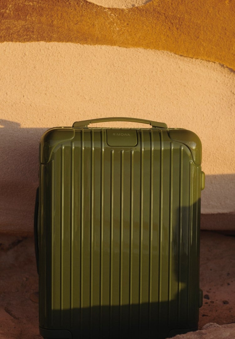 rimowa green suitcase